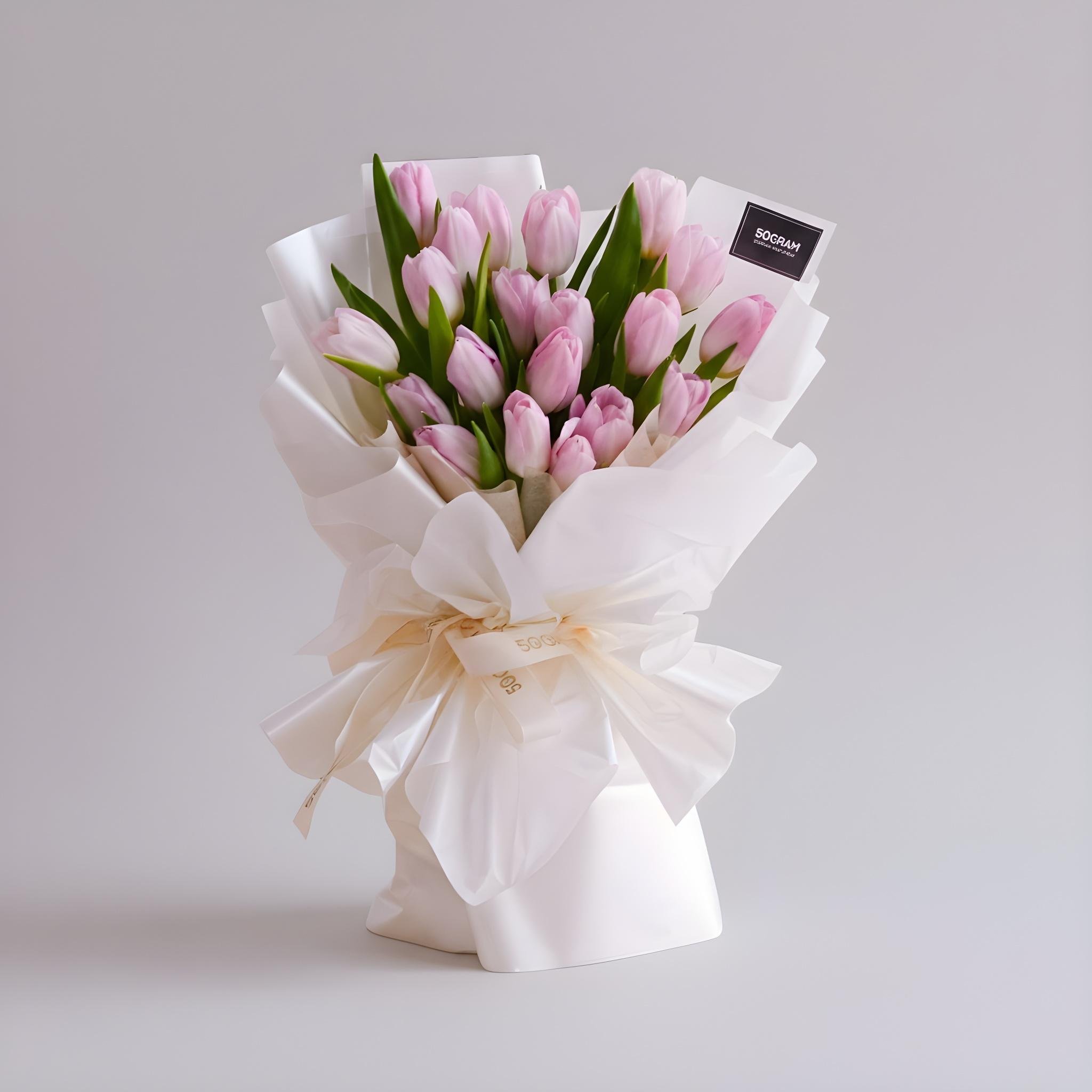 Light pink tulips hand bouquet