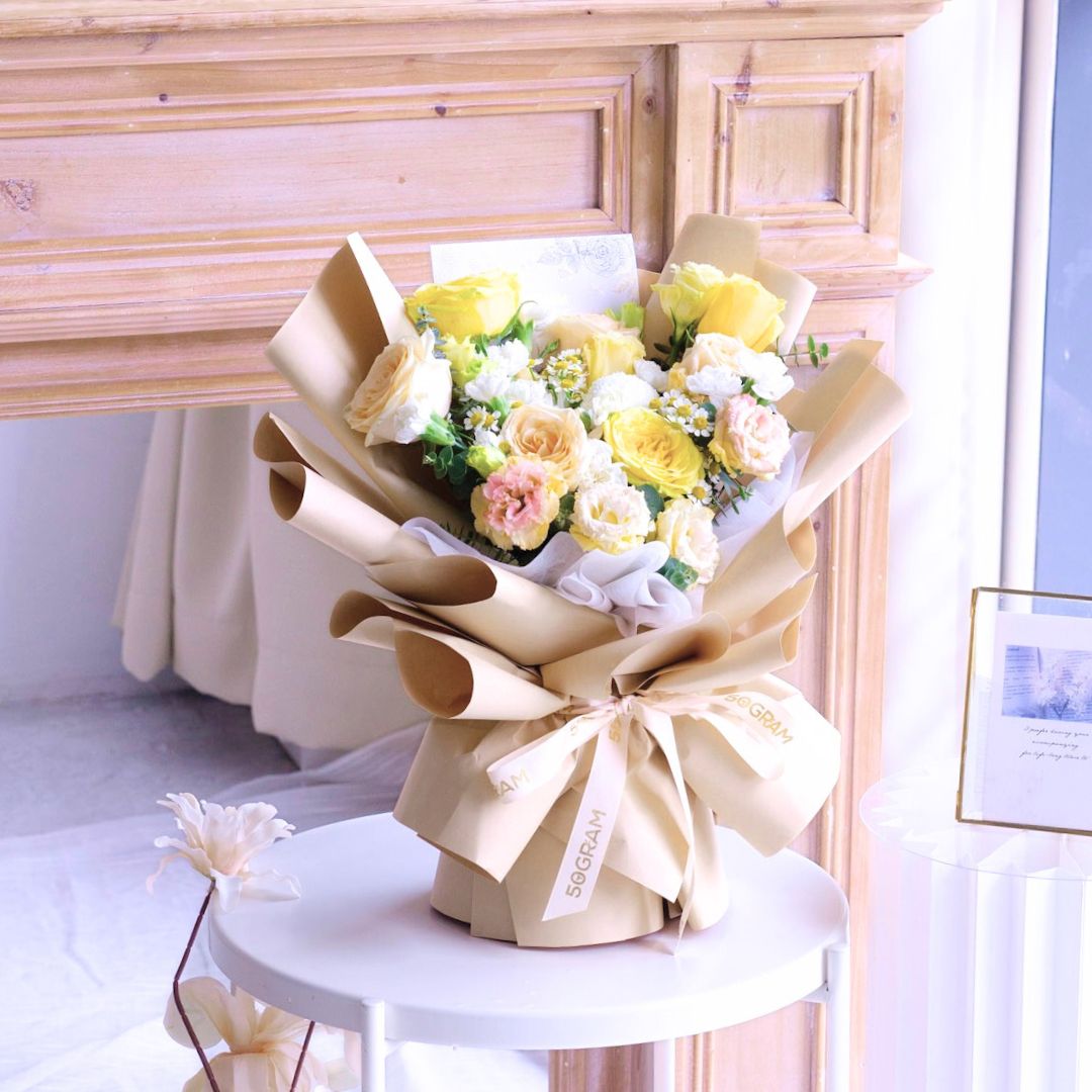 Yellow serenade yellow rose hand bouquet - image 9